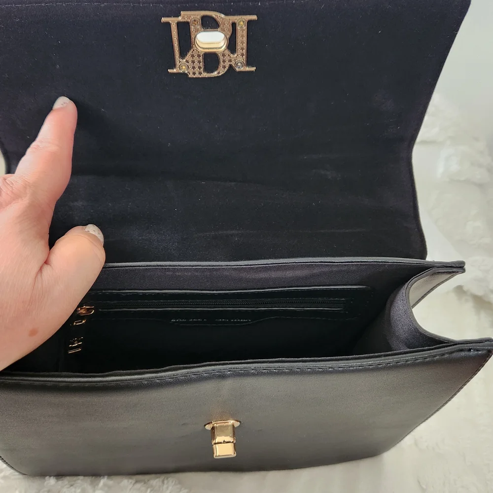 Badgley Mischka Black Vegan Leather Top-Handle Satchel With Crossbody Strap.